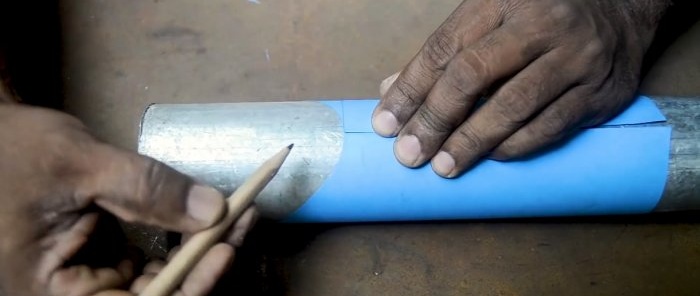 Cómo marcar una tubería para un corte preciso para soldar un codo de 90 grados
