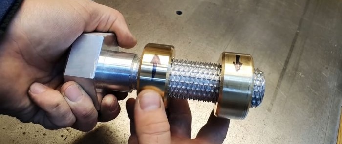 Screw on two nuts