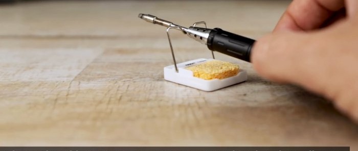 Use a soldering iron stand