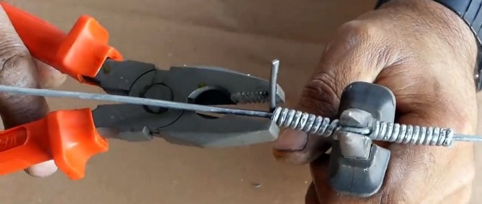 Twist the wire with pliers