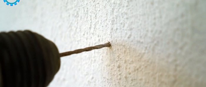 Boring af væggen