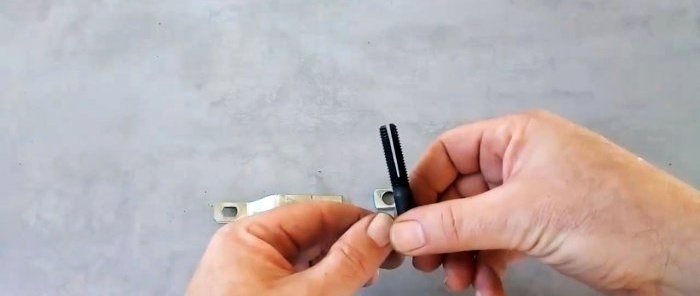 The bolt is cut in half lengthwise