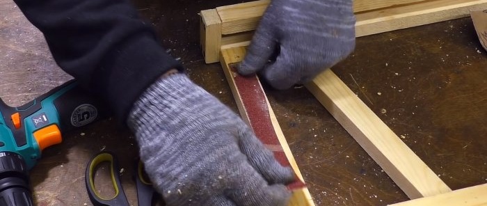 a strip of sandpaper is glued to the bottom rail