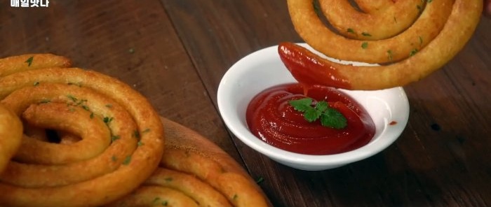 Delicious crispy mega appetizing potato curls are ready