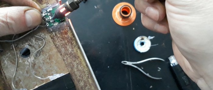 How to inexpensively assemble a third hand holder with a magnifying glass, light and fan
