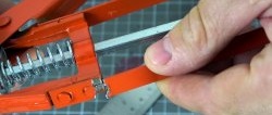 How to use a broken caulking gun to make a jack for home furniture and more