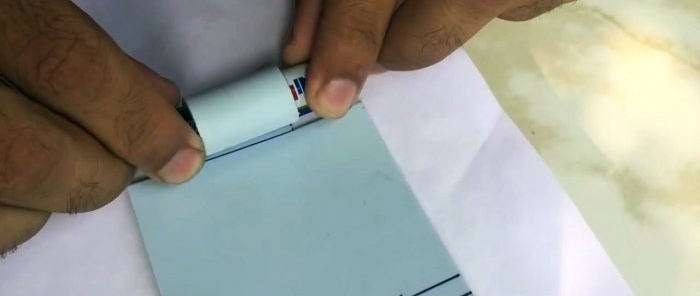 Cara membuat pendirian telefon boleh laras daripada paip PVC