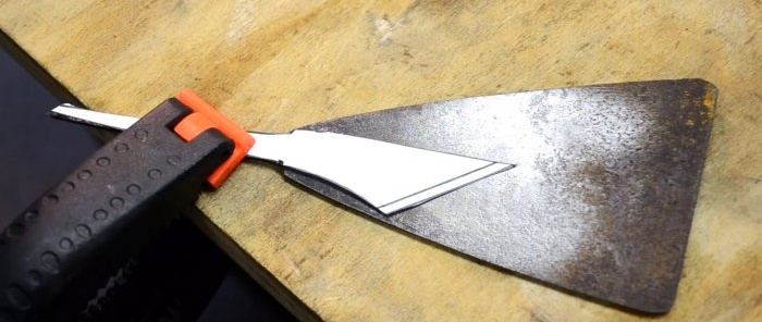 Cómo hacer un cortador con una espátula vieja.