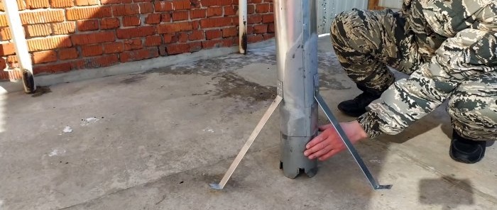 A simple stove being tested for a greenhouse or tent