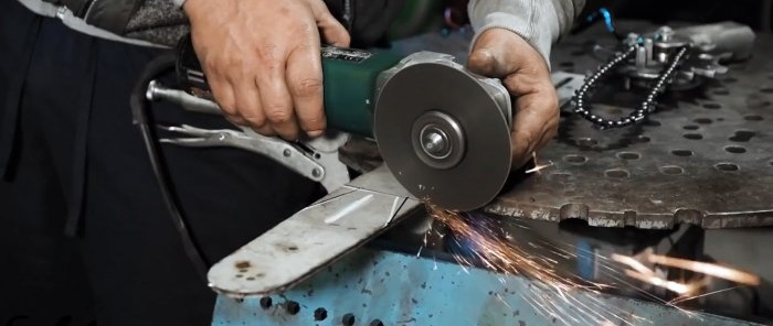 Scie à chaîne DIY à partir d'un entraînement de lève-vitre