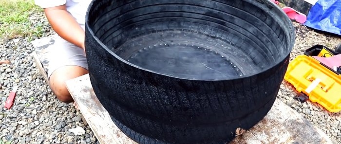 Hogyan készítsünk víztartályt egy régi gumiabroncsból