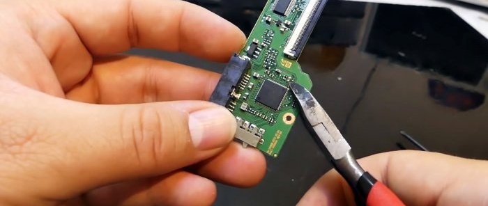 כיצד לשדרג מחשב נייד ישן על ידי החלפת כונן ה-DVD ב-SSD