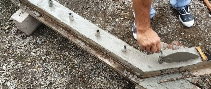 Hoe pijlers van gewapend beton te maken en doorschijnende hekwerken te installeren