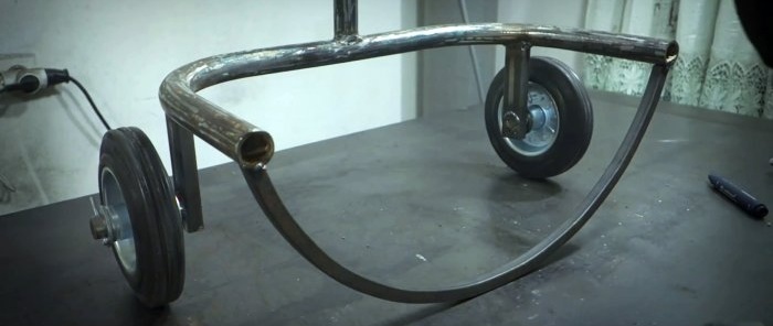 Bagaimana untuk membuat kekili hos taman mudah alih dari rim roda