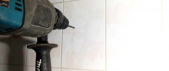 How to drill into tiles with a concrete drill so that it doesn't crack