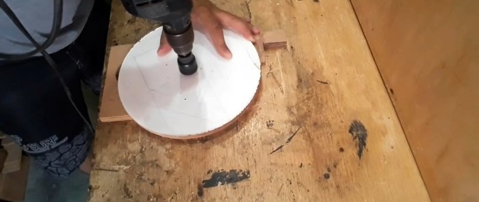Cum să faci un ventilator radial pentru o hotă de atelier din placaj și motorul unei mașini de spălat