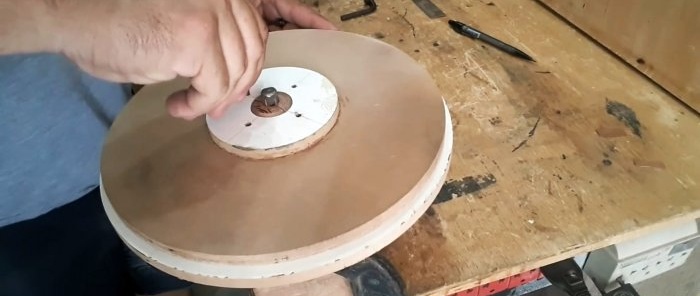 Cómo hacer un ventilador radial para una campana de taller con madera contrachapada y un motor de lavadora