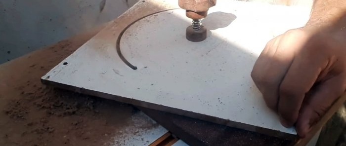 كيفية صنع مروحة شعاعية لغطاء الورشة من الخشب الرقائقي ومحرك الغسالة