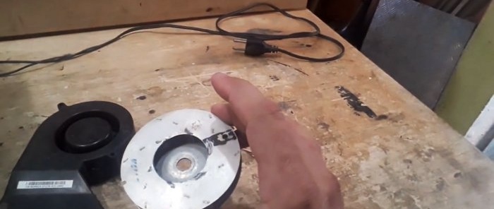 Hur man gör en radialfläkt för en verkstadshuv av plywood och en tvättmaskinsmotor