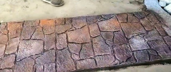 Kā ieliet betona dārza celiņu ar akmens imitāciju
