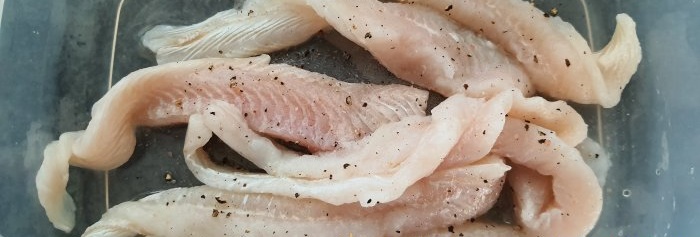 Cara memasak ikan pangasius putih dengan cantik dan tanpa roti, sama seperti di restoran