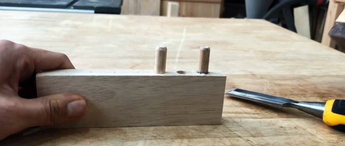 Bagaimana untuk mengikat dowel dalam kayu menggunakan prinsip penambat dalam konkrit