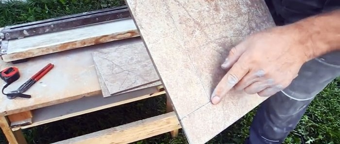 Hoe tegels te snijden met een slijpmachine zonder te chippen