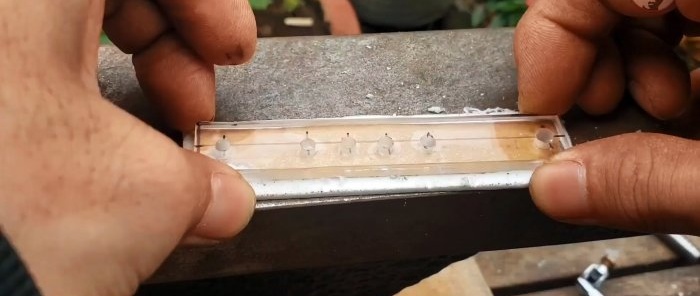 Hoe je een hulpmiddel maakt voor het markeren van gladde bochten van profielbuizen