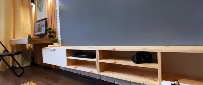 Kā izveidot piekārtu TV statīvu ar slēptu stiprinājumu