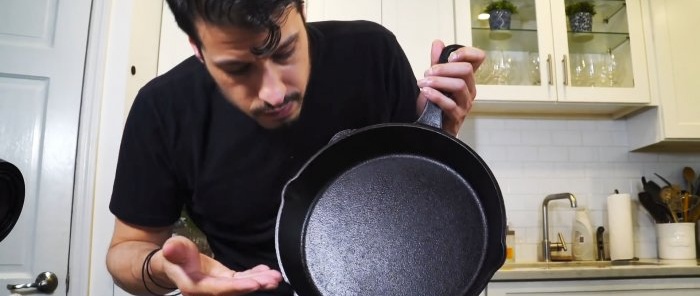 How to properly clean a cast iron frying pan after use to maintain its non-stick properties