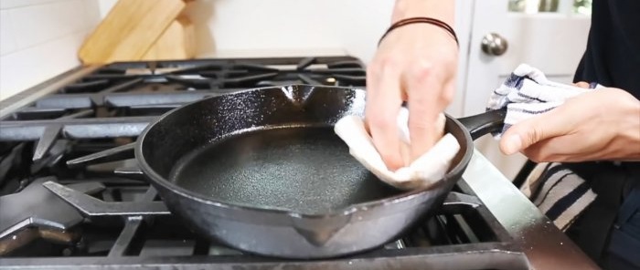 How to properly clean a cast iron frying pan after use to maintain its non-stick properties