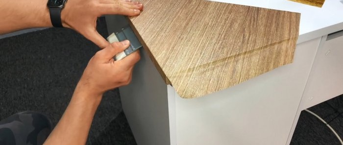 How to stick self-adhesive film on the corners and edges of furniture