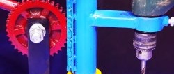 A simple stand for a drill driven by a chain and timing sprocket