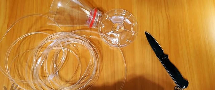 Come srotolare una bottiglia in PET su un nastro senza tagliabottiglie