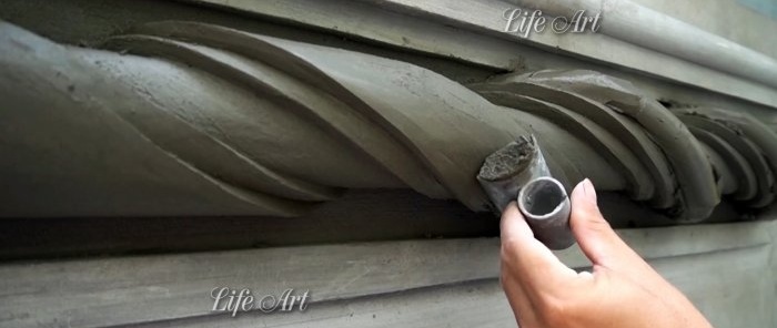 Cum să decorați o fațadă sub forma unei spirale de ciment