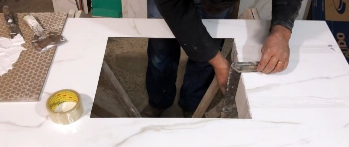 Hoe maak je een badkamergootsteen van keramische tegels
