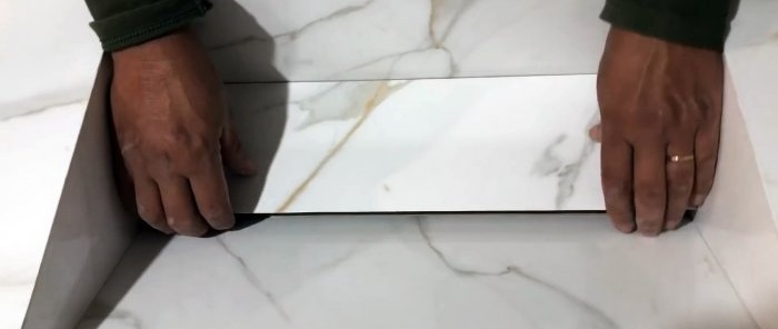 Hoe maak je een badkamergootsteen van keramische tegels