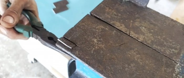 Hvordan lage en enkel og pålitelig dørlås av metallrester