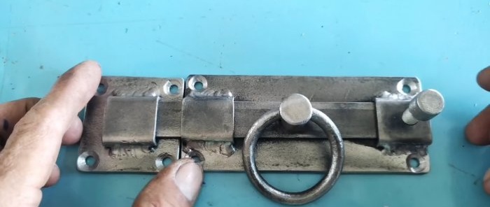 Artık metalden basit ve güvenilir bir kapı mandalı nasıl yapılır