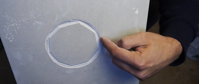 Cum să tăiați o gaură mare și uniformă în plăci ceramice cu o râșniță