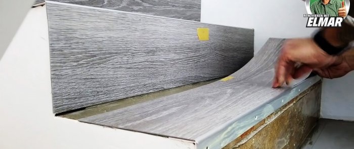 Comment joliment décorer un escalier en bois avec des carreaux de vinyle