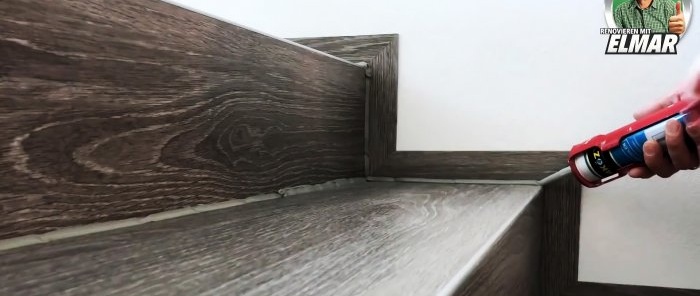 Comment joliment décorer un escalier en bois avec des carreaux de vinyle