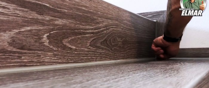 Hvordan man smukt dekorerer en trætrappe med vinylfliser
