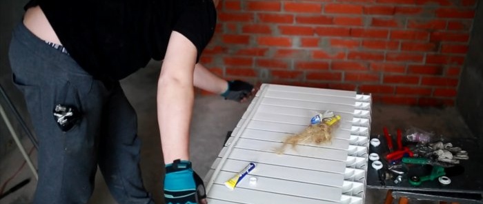 Hvordan lage en lang radiator varme helt opp med sidetilkobling