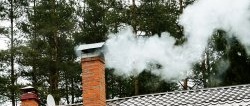 An old-fashioned method of contactless cleaning of a stove chimney