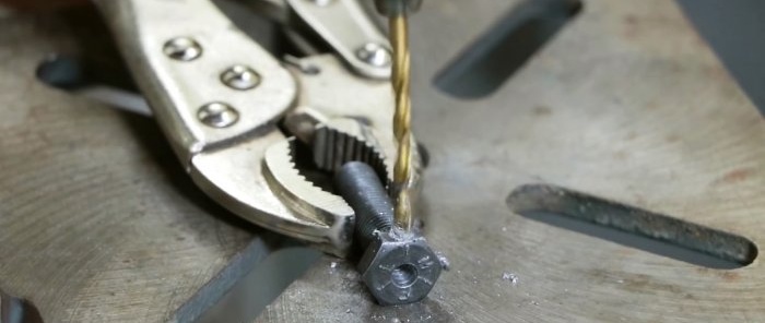 Hoe u een boorkop met een bout op een dunne elektromotoras bevestigt