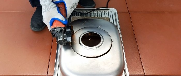 Hvordan lage en enkel vedovn fra en kjøkkenvask