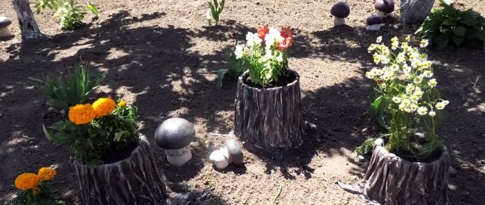 DIY stump planter from an old bucket and rags