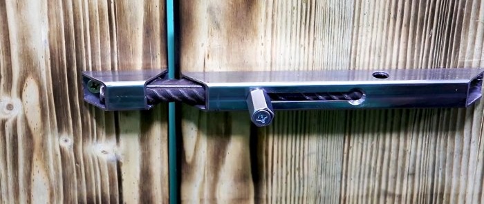 The simplest door bolt made from a piece of profile and fittings