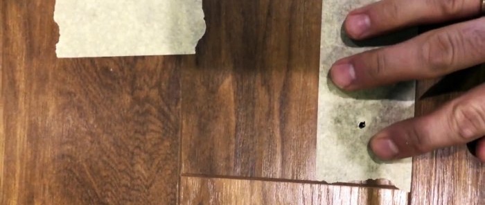 Bagaimana untuk mengeluarkan lantai lamina yang berkeriut tanpa membukanya